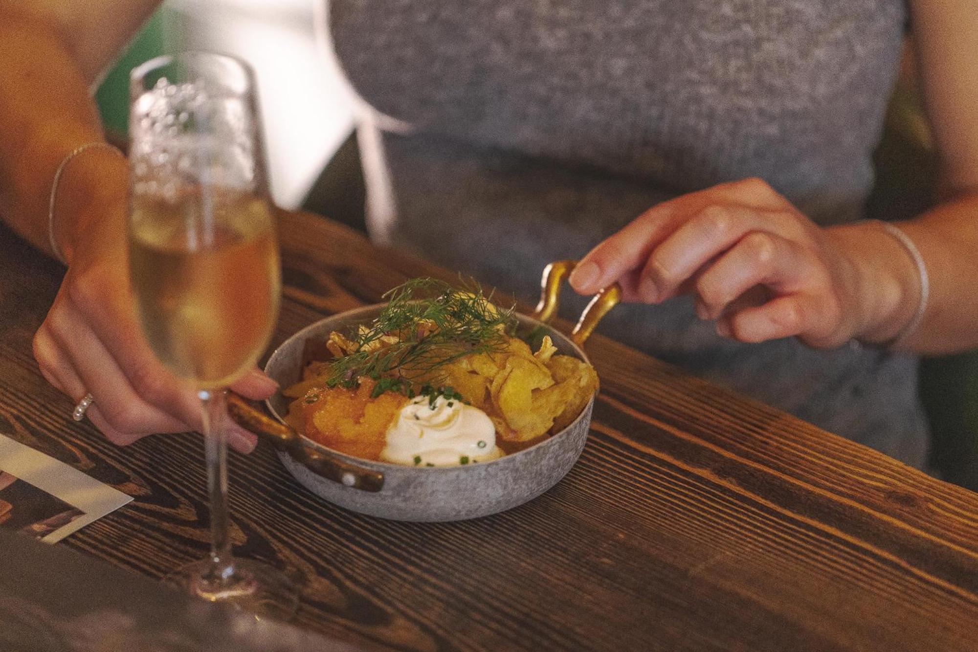 Hotel Pigalle Gothenburg Bagian luar foto A woman eating tapas