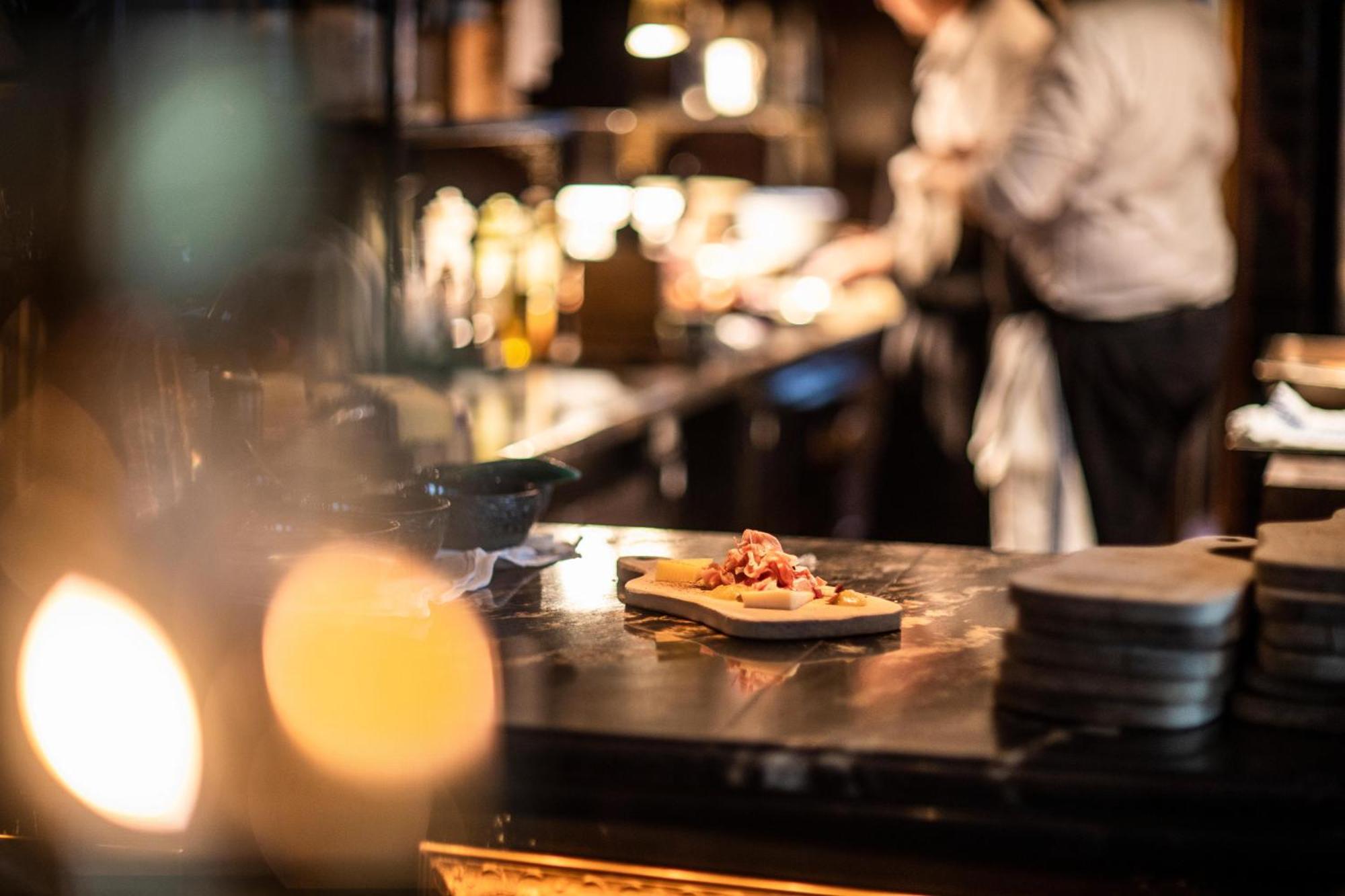 Hotel Pigalle Gothenburg Bagian luar foto A chef at work